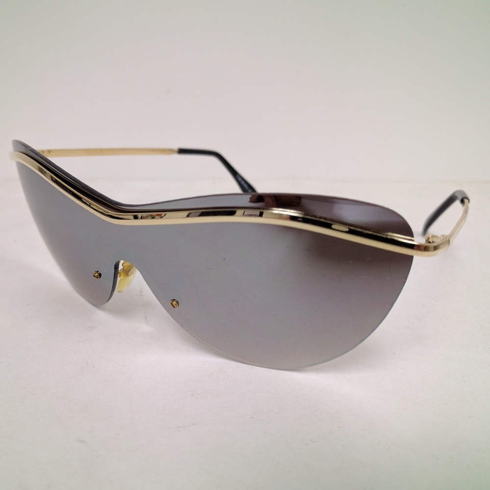 NWT true vintage 80's / 90's lady's fashion wing rimless blade sunglasses